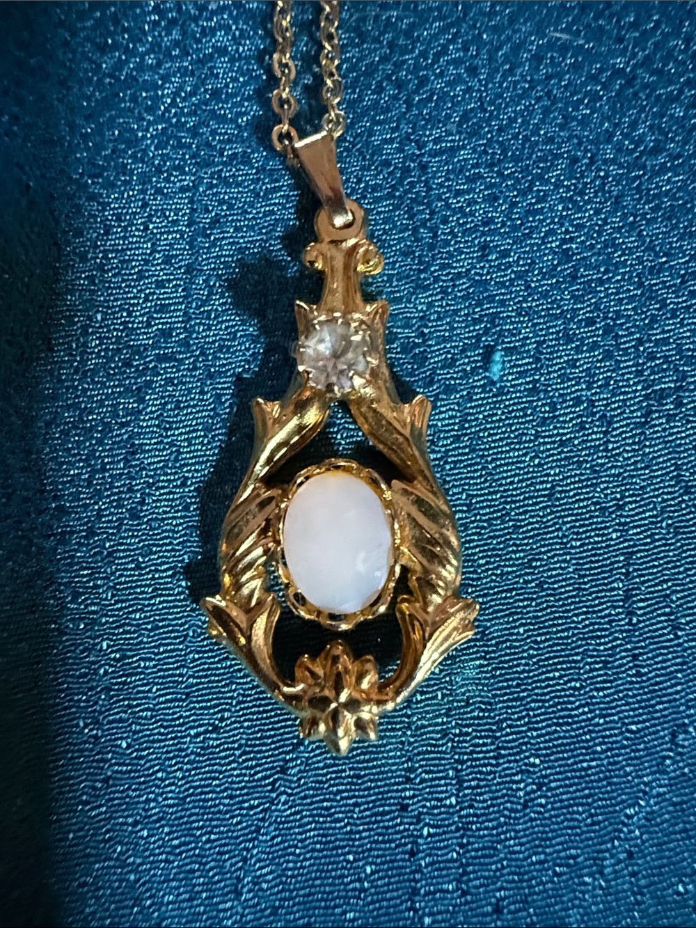 Gold-Tone Pendant Necklace with White Oval Stone